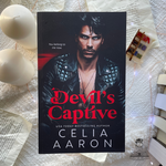 Load image into Gallery viewer, Devil&#39;s Captive: A Forced Marriage Mafia Romance by Celia Aaron
