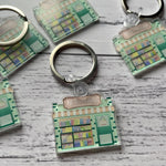 Load image into Gallery viewer, Off the Book Pages Acrylic Key Rings
