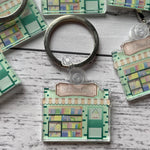 Load image into Gallery viewer, Off the Book Pages Acrylic Key Rings
