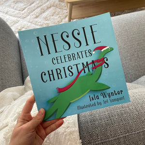 Nessie Celebrates Christmas by Isla Wynter