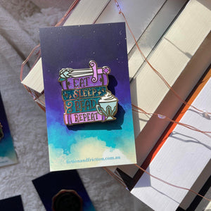 Eat Sleep Read Repeat Enamel Pin