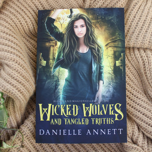 Wicked Wolves and Tangled Truths by Daniella Annett
